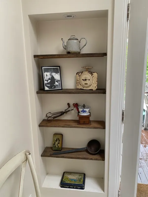 Kitchen shelf — items arranged as shown