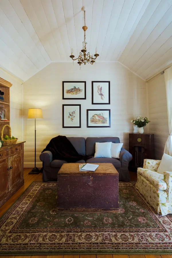 Sunroom — cushions plumped, throws folded